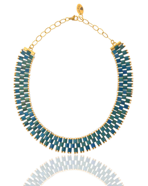 Miyuki Necklace in metallic blue and green tones with gold accents on a white background